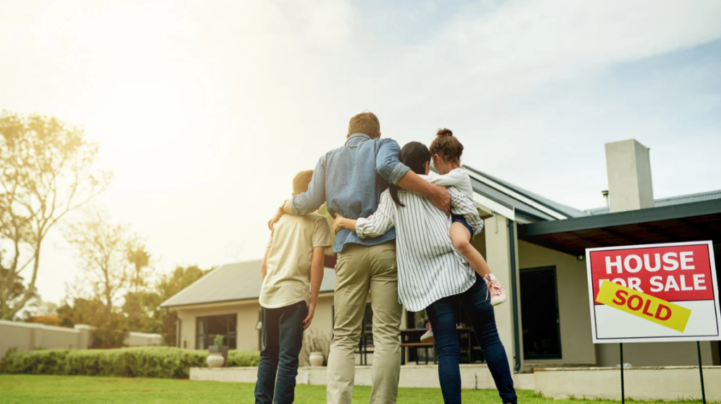 Family discussing major life changes that may require a life insurance policy review