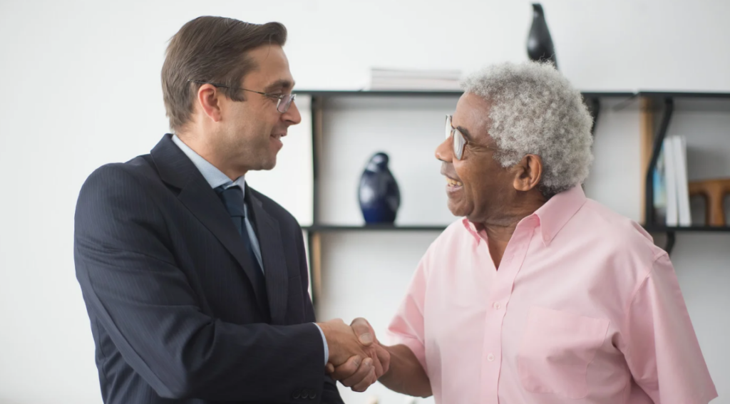 Family reviewing whether employer-sponsored life insurance provides enough financial protection